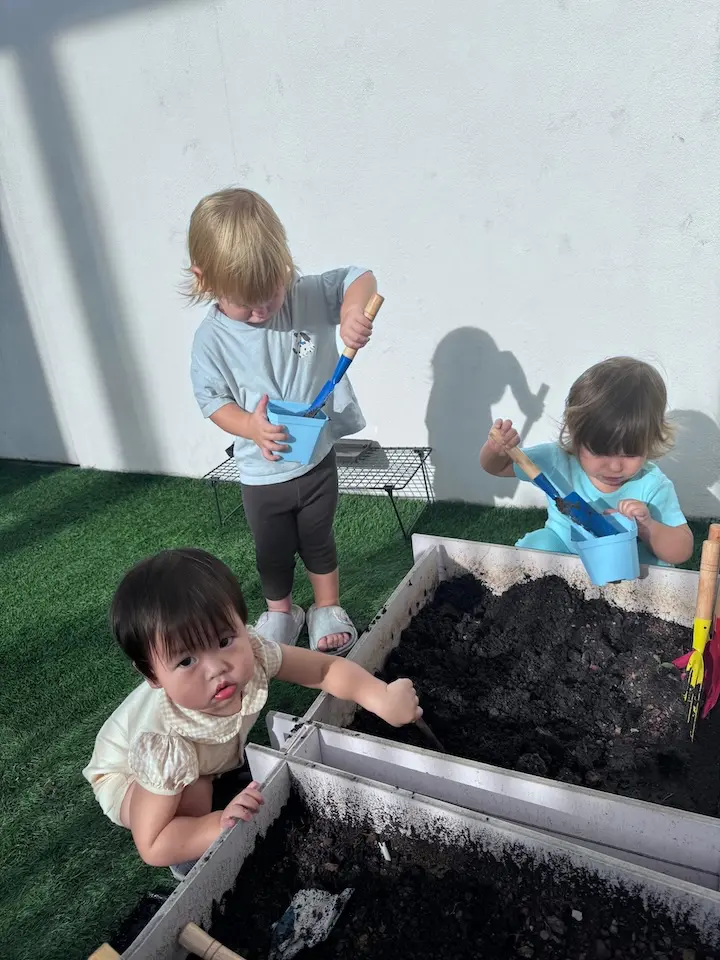 Children gardening together